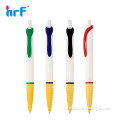 White ball pen with yellow rubber grip